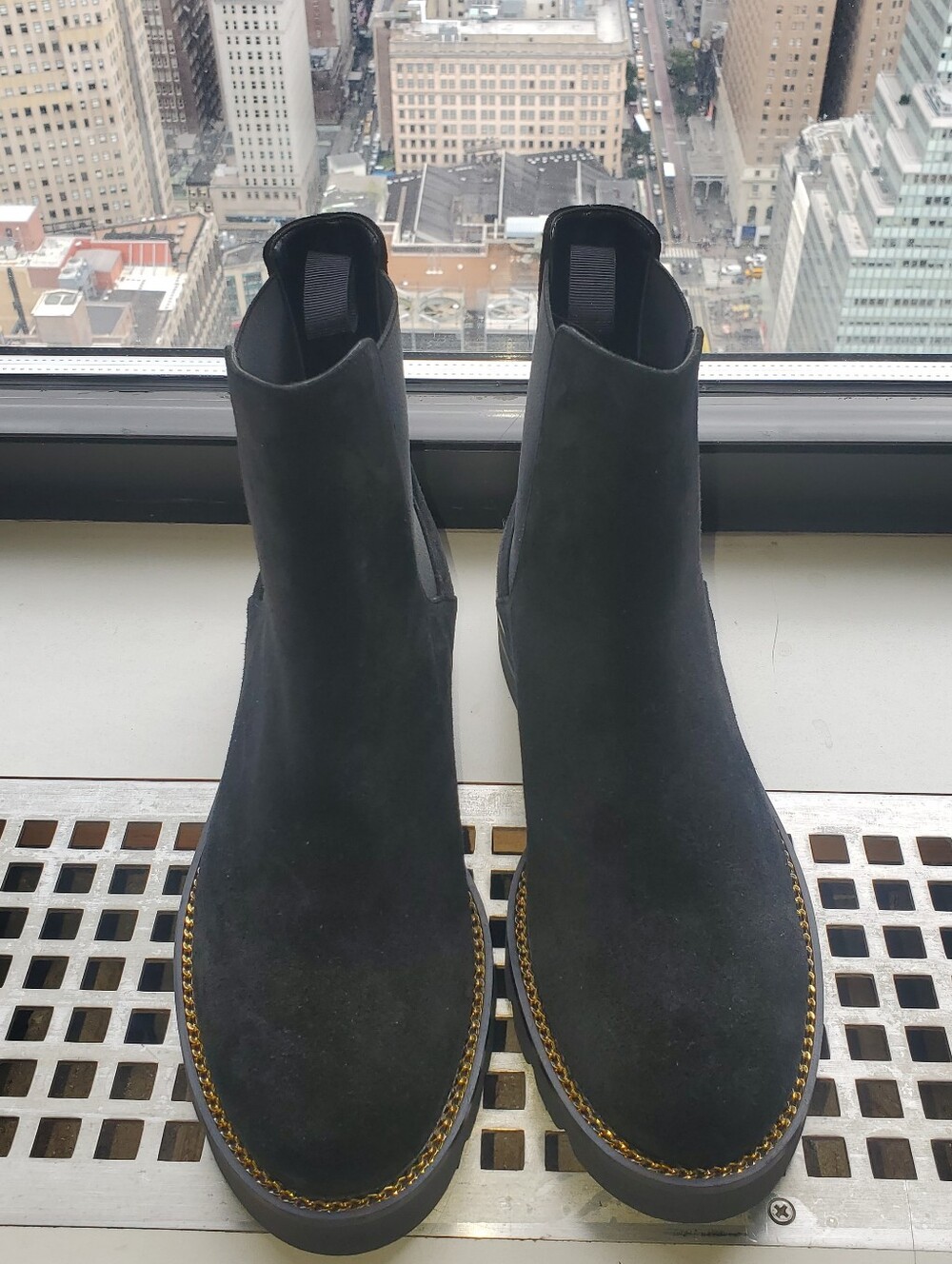 Stuart Weitzman Black Suede Chelsea Booties with Gold Chain Trim